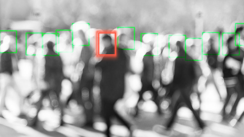 DISGRID: Discrimination and Group Identities Menschenmenge, Personen sind grün markiert, eine Person daraus rot